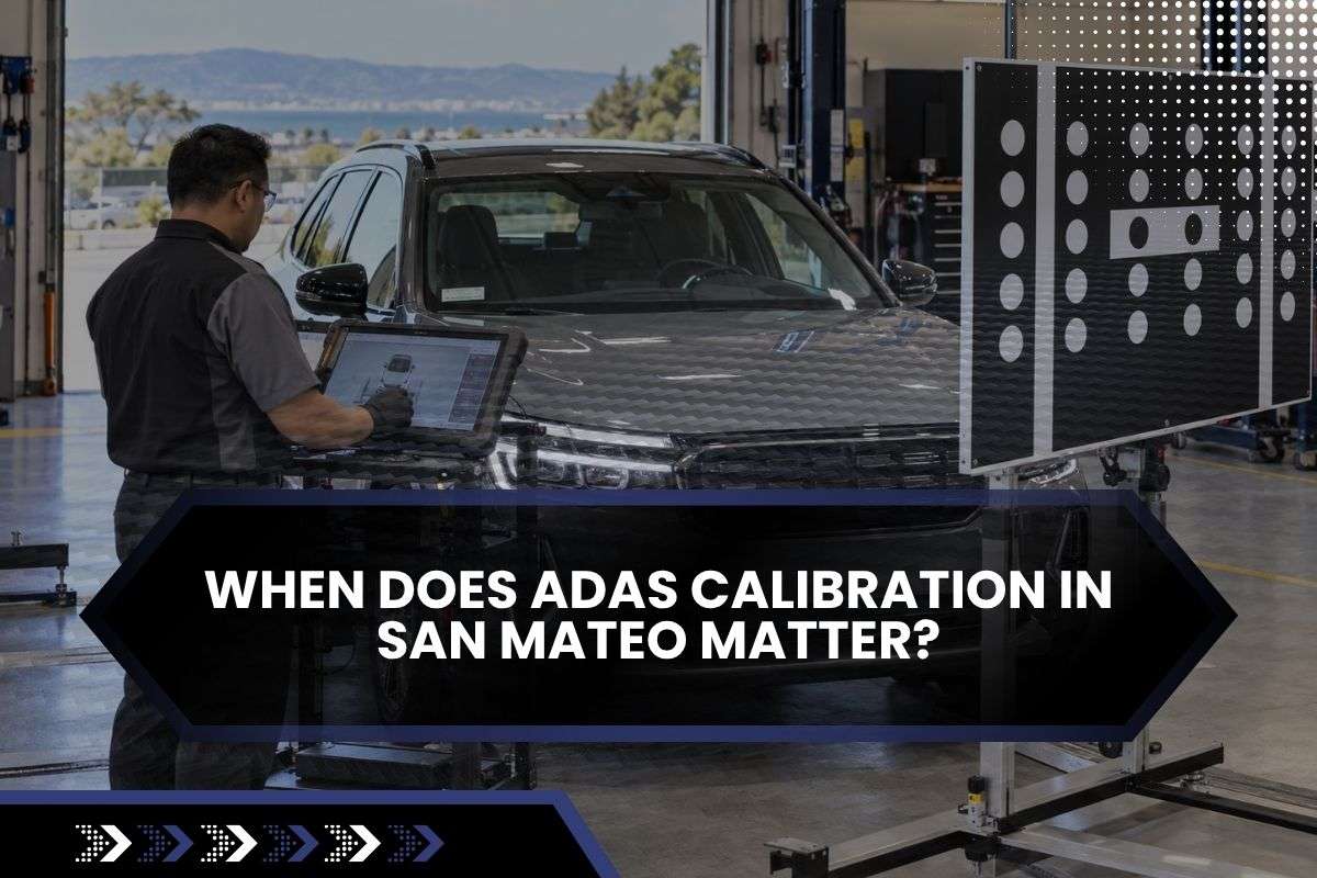 Technician performing ADAS calibration after windshield replacement on a modern vehicle