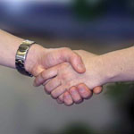 Shaking hands and closing deal